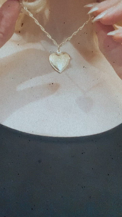 Heart locket keepsake charm on necklace